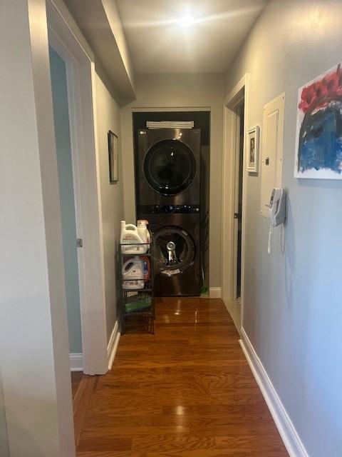 Stackable washer and dryer at the end of the hallway