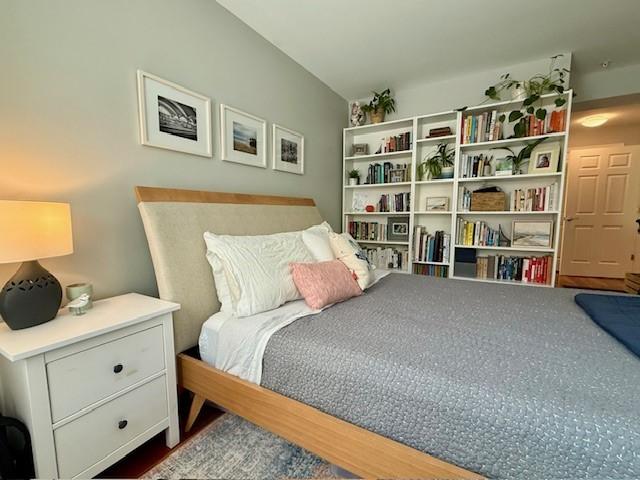 Primary bedroom with hard flooring