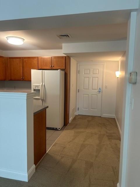 View facing kitchen and entryway