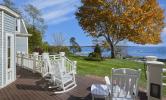 The back deck of Howells House complete with rocking chairs