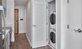 studio floorplan laundry closet with stacked washer and dryer
