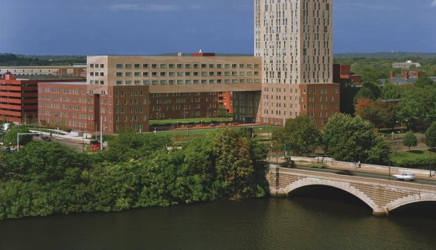 View of One Western Ave across the river